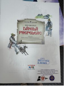 Roemeens kinderboek in de bibliotheek van Rusini, Moldavië, gekocht met steun van SMHO ter vervanging van Russischtalige boeken